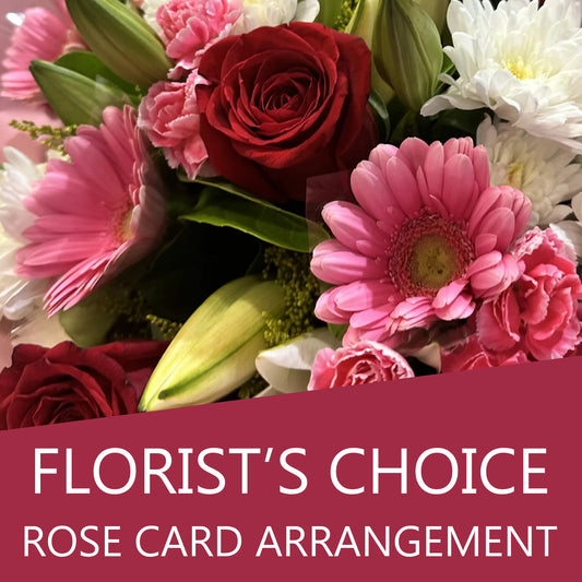 Florist's Choice rose card arrangement with mixed flowers, vibrant roses, and greenery, arranged in a decorative bouquet.